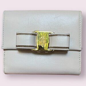 Ferragamo Elegant Cream Wallet with Gold  And LeatherBow Accent